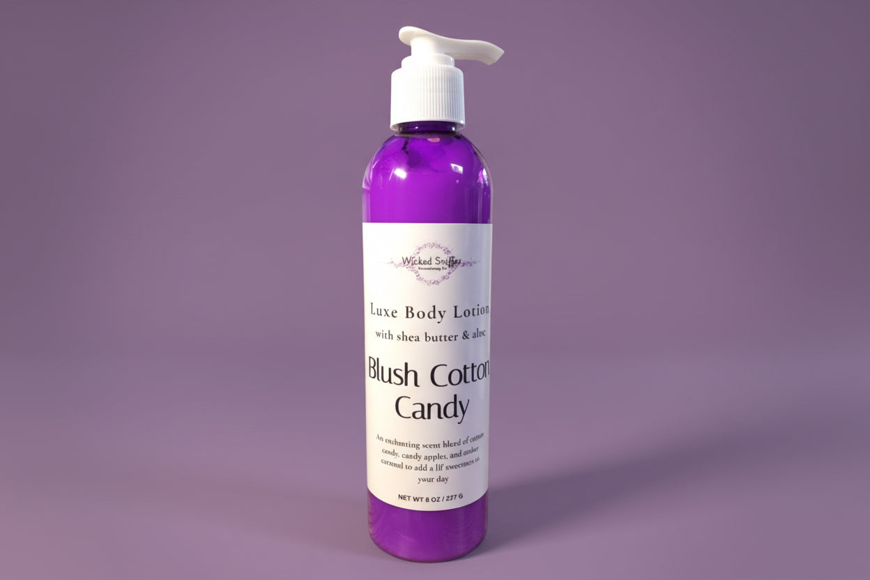 Bottle of 'Blush Cotton Candy' body lotion on a purple background