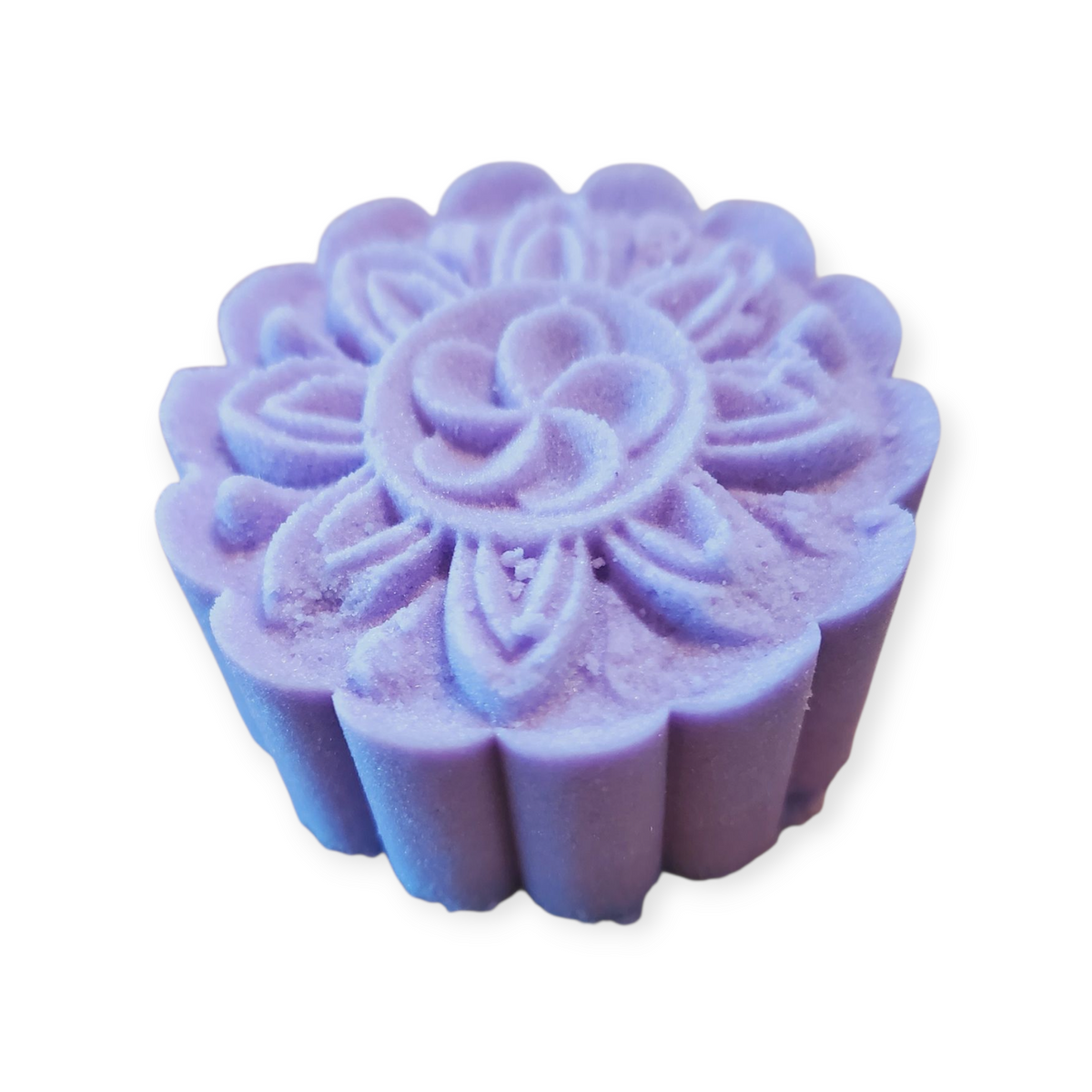 Purple flower-shaped shower steamer on a white background