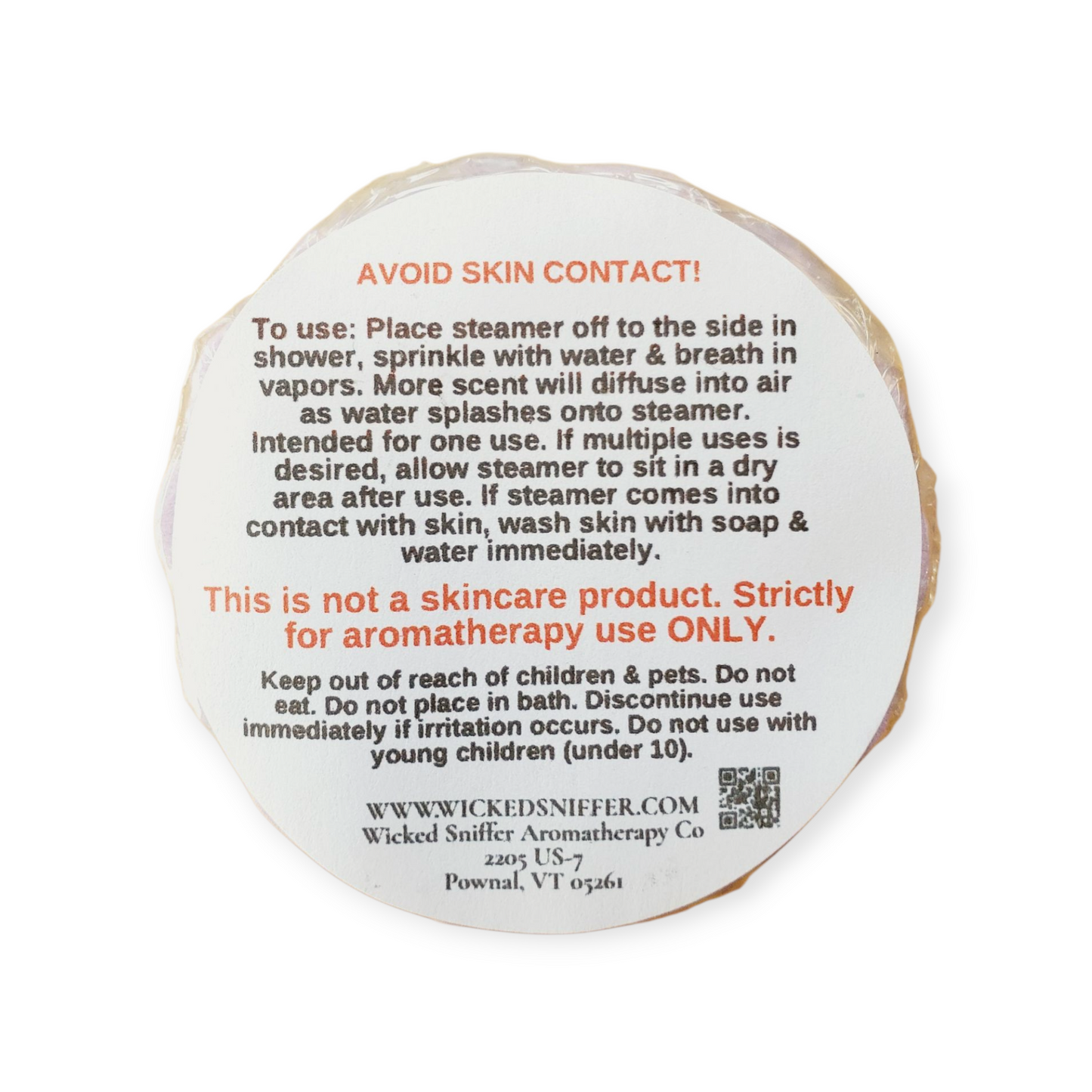 Round white label with black text on a white background