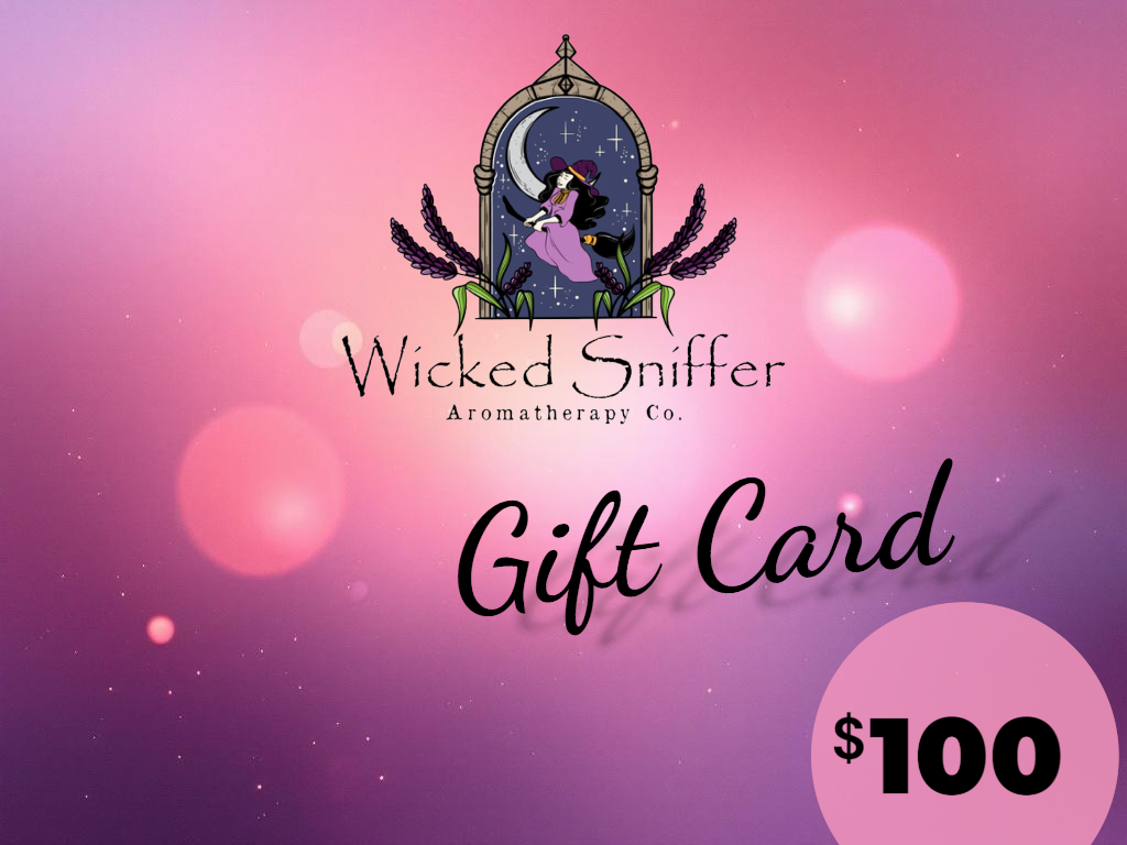 Wicked Sniffer Aromatherapy Co. gift card with a pink and purple gradient background.