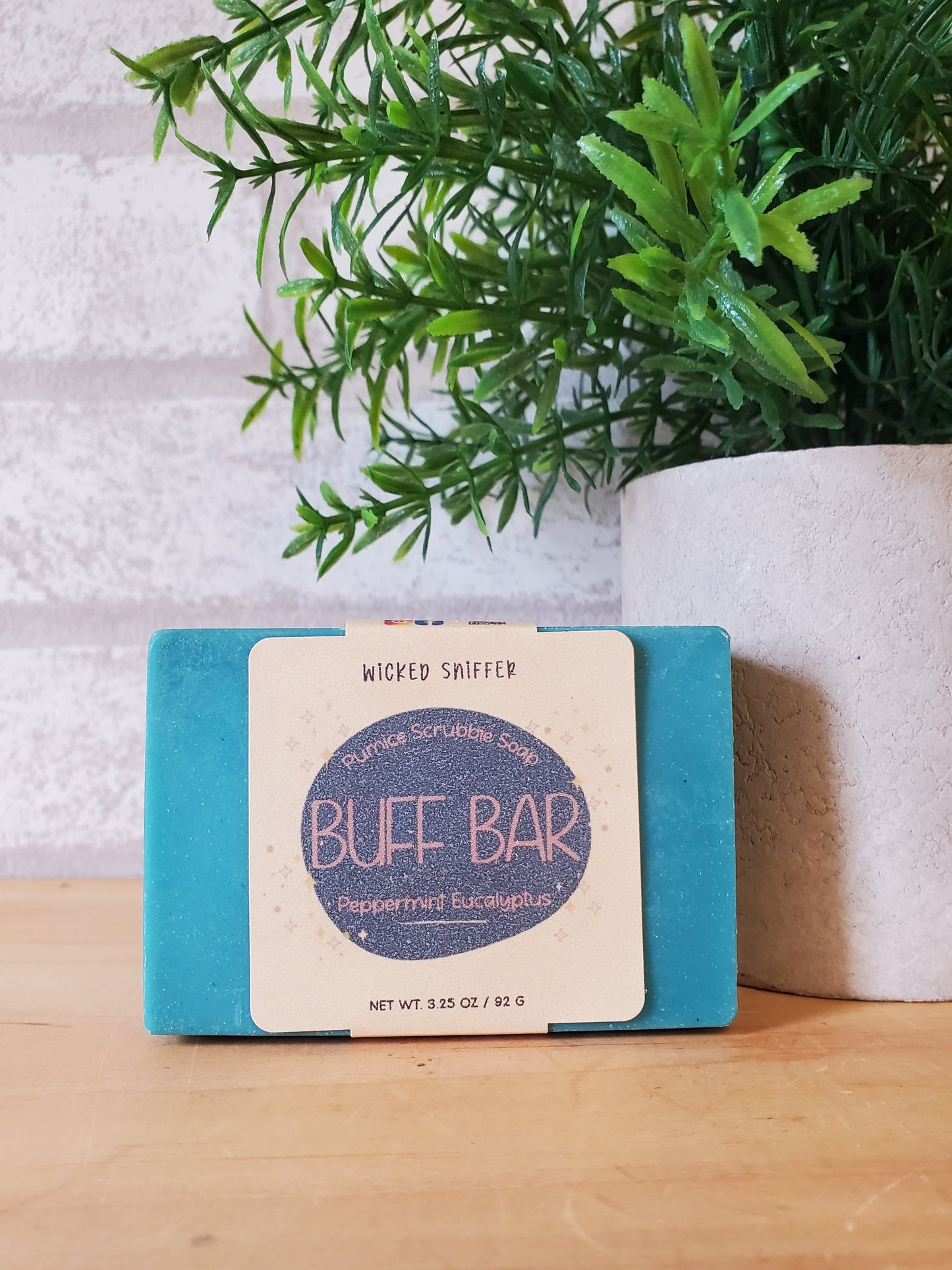 Bar of handmade Buff Bar cold process soap on a light background made in Vermont