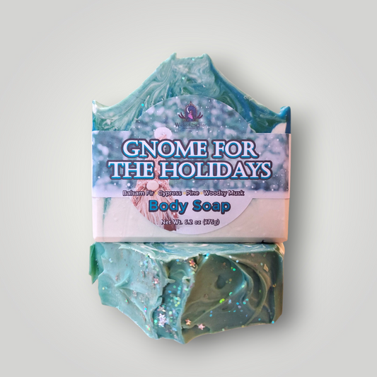 Bar of soap with a decorative label on a light gray background