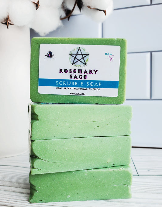 Picture of 4 green bars of soap stacked high with a white rectangular label with a pentagram.