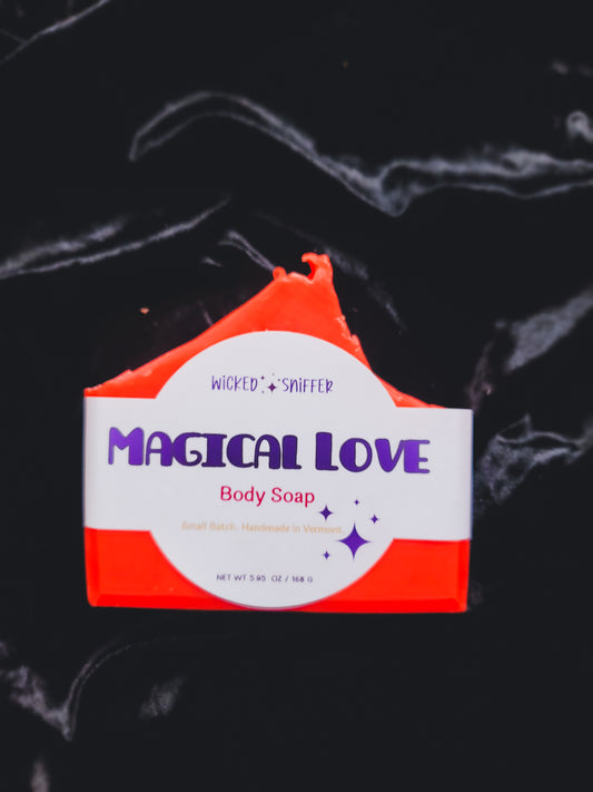 Body soap bar with 'Magical Love' branding on a dark background