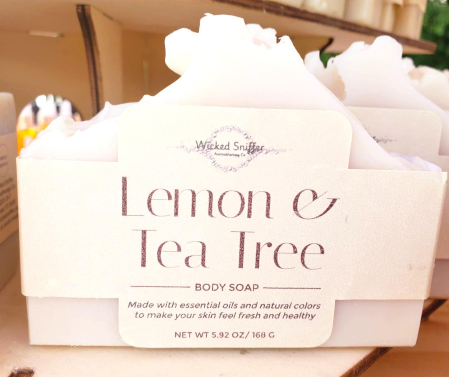 Bar of Lemon & Tea Tree body soap with Wicked Sniffer branding.