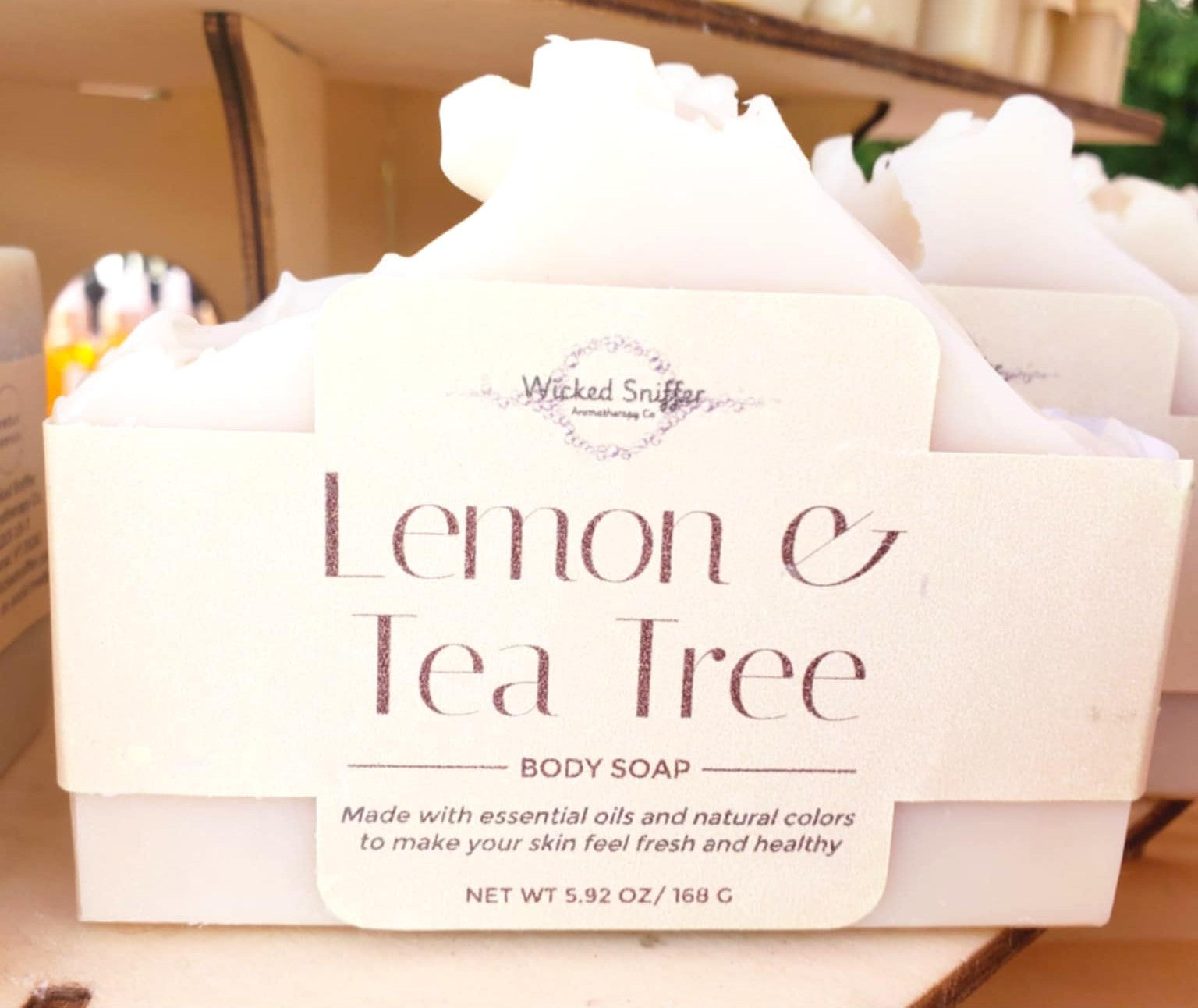 Bar of Lemon & Tea Tree body soap with Wicked Sniffer branding.