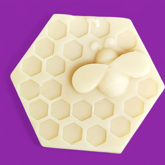 Hexagonal slotion bar with 
honeycomb pattern on a purple background