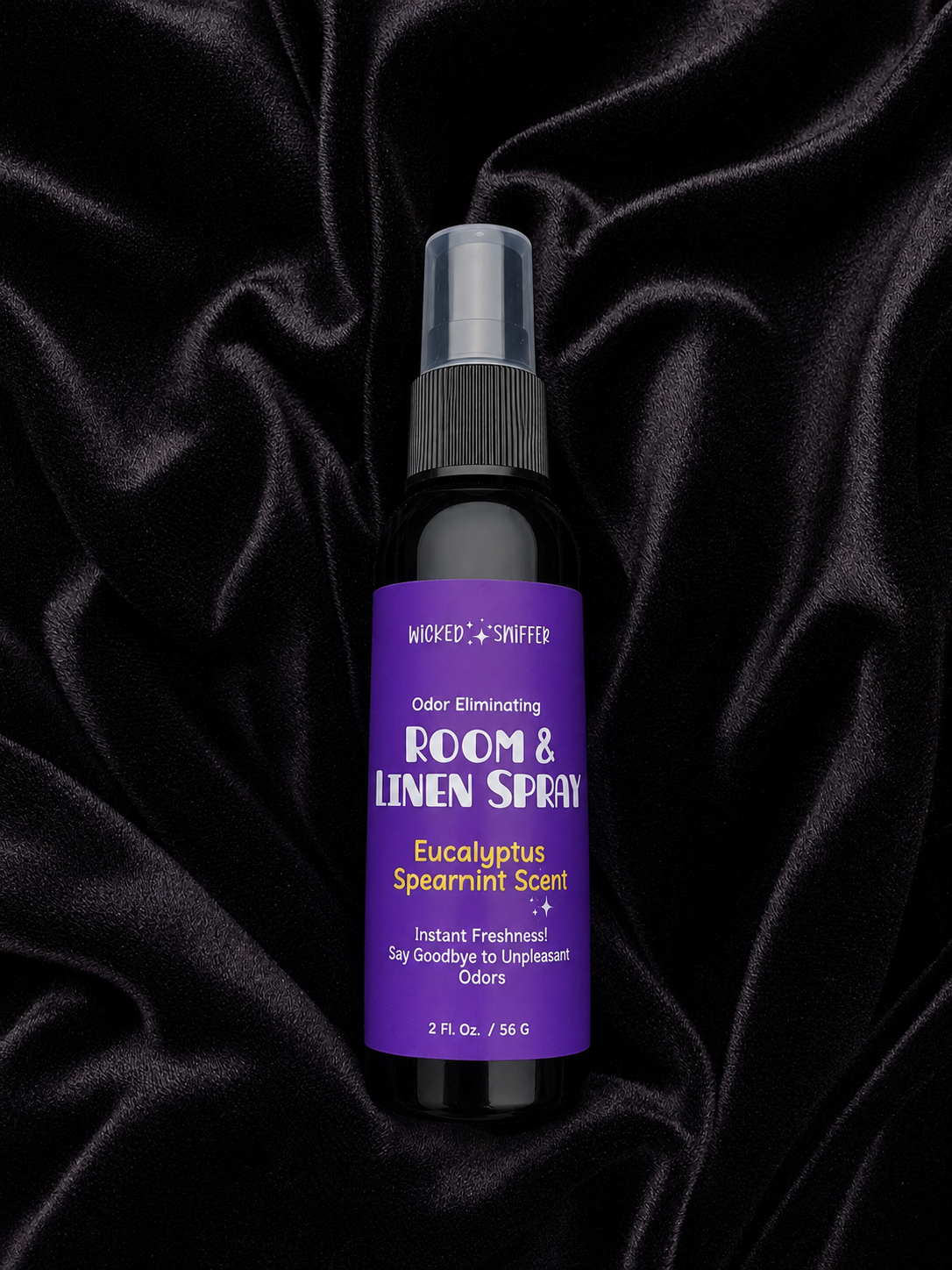 Bottle with purple label on a black background 