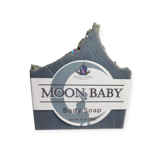 Bar of soap with 'Moon Baby' branding on a white background