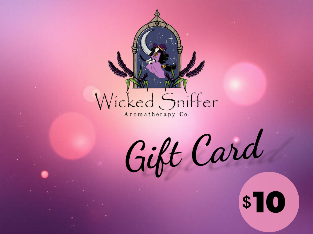 Wicked Sniffer Aromatherapy Co. gift card with a pink and purple gradient background.