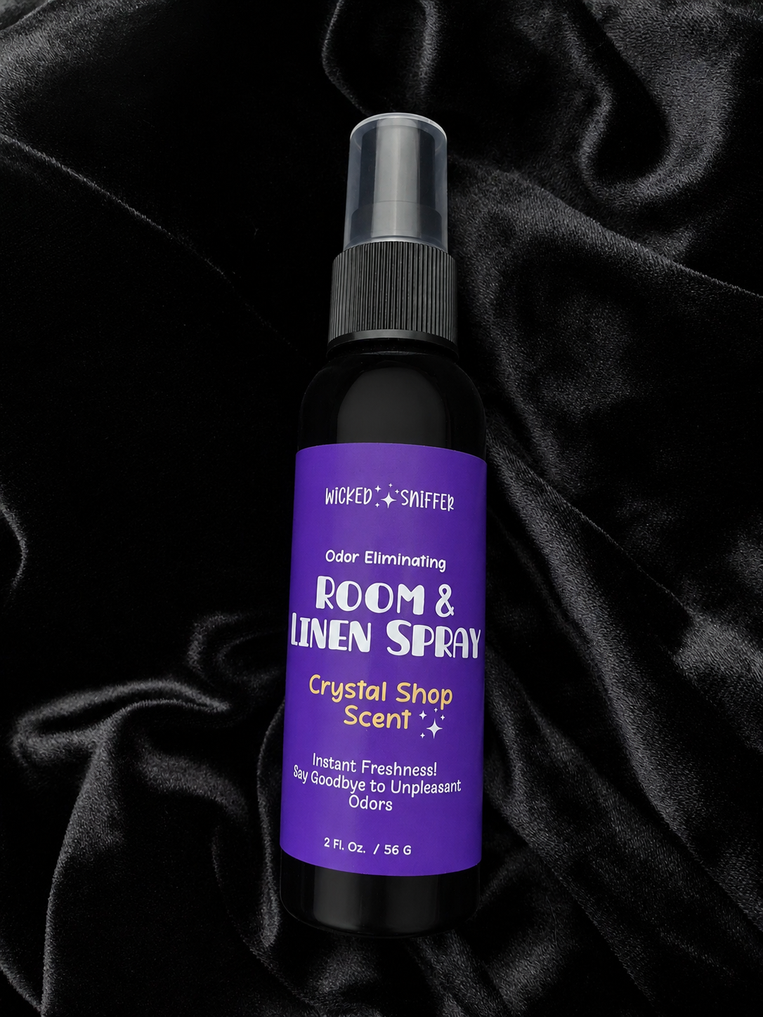 Bottle with purple label on a black background 