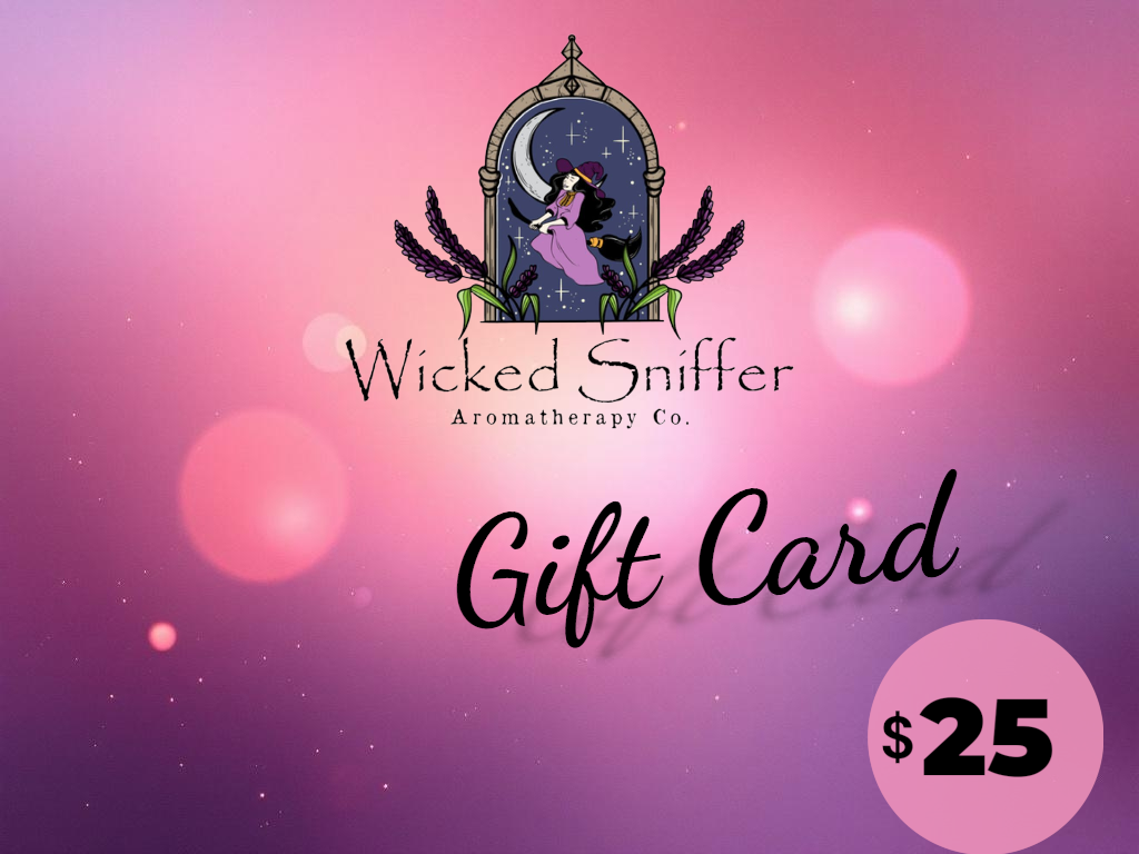 Wicked Sniffer Aromatherapy Co. gift card with a mystical design on a pink and purple gradient background.