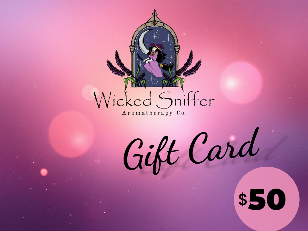 Wicked Sniffer Aromatherapy Co. gift card with a pink and purple gradient background.