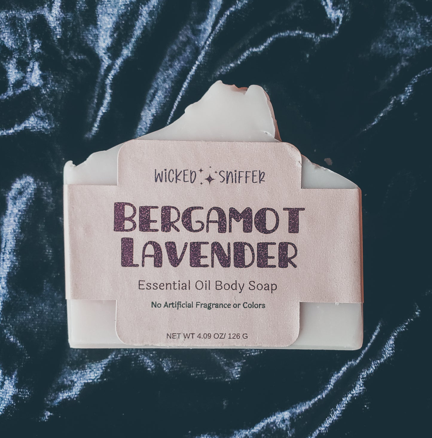 Tan bar of soap on a black background